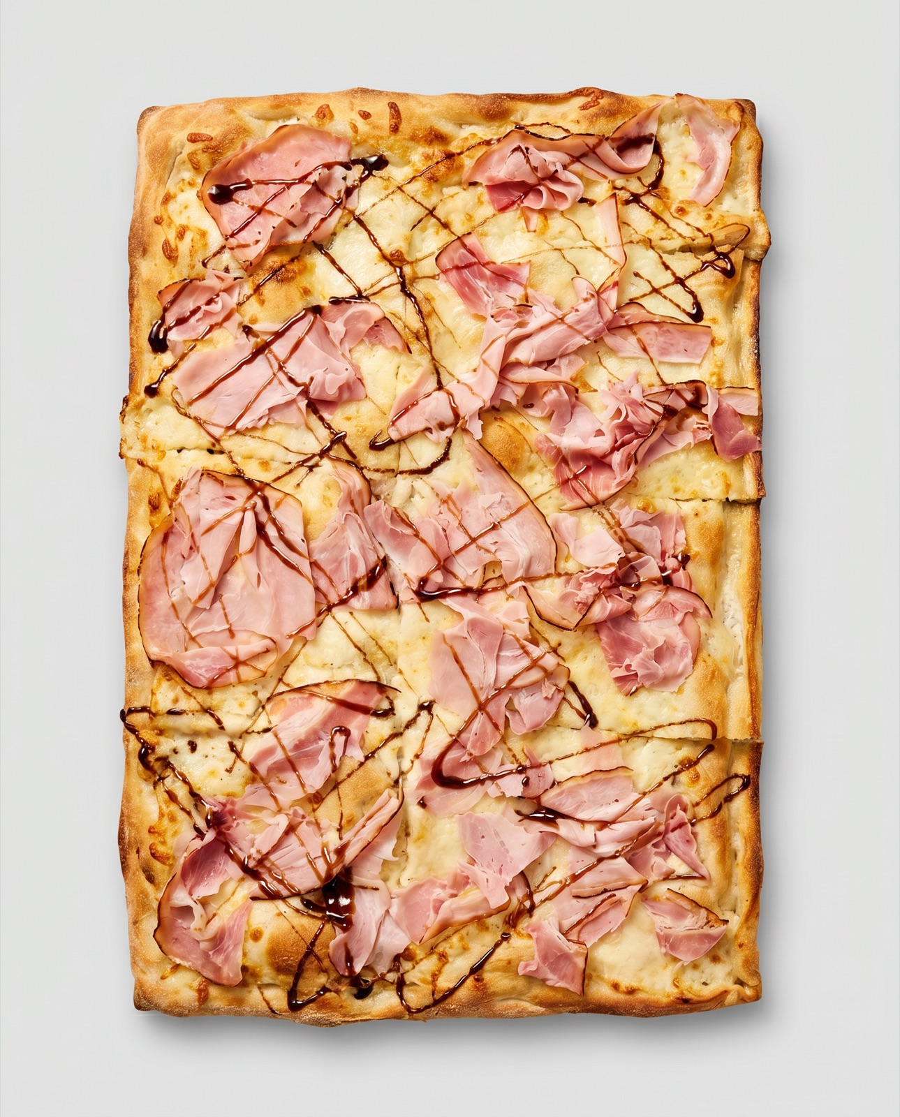 Pizza al trancio con prosciutto cotto